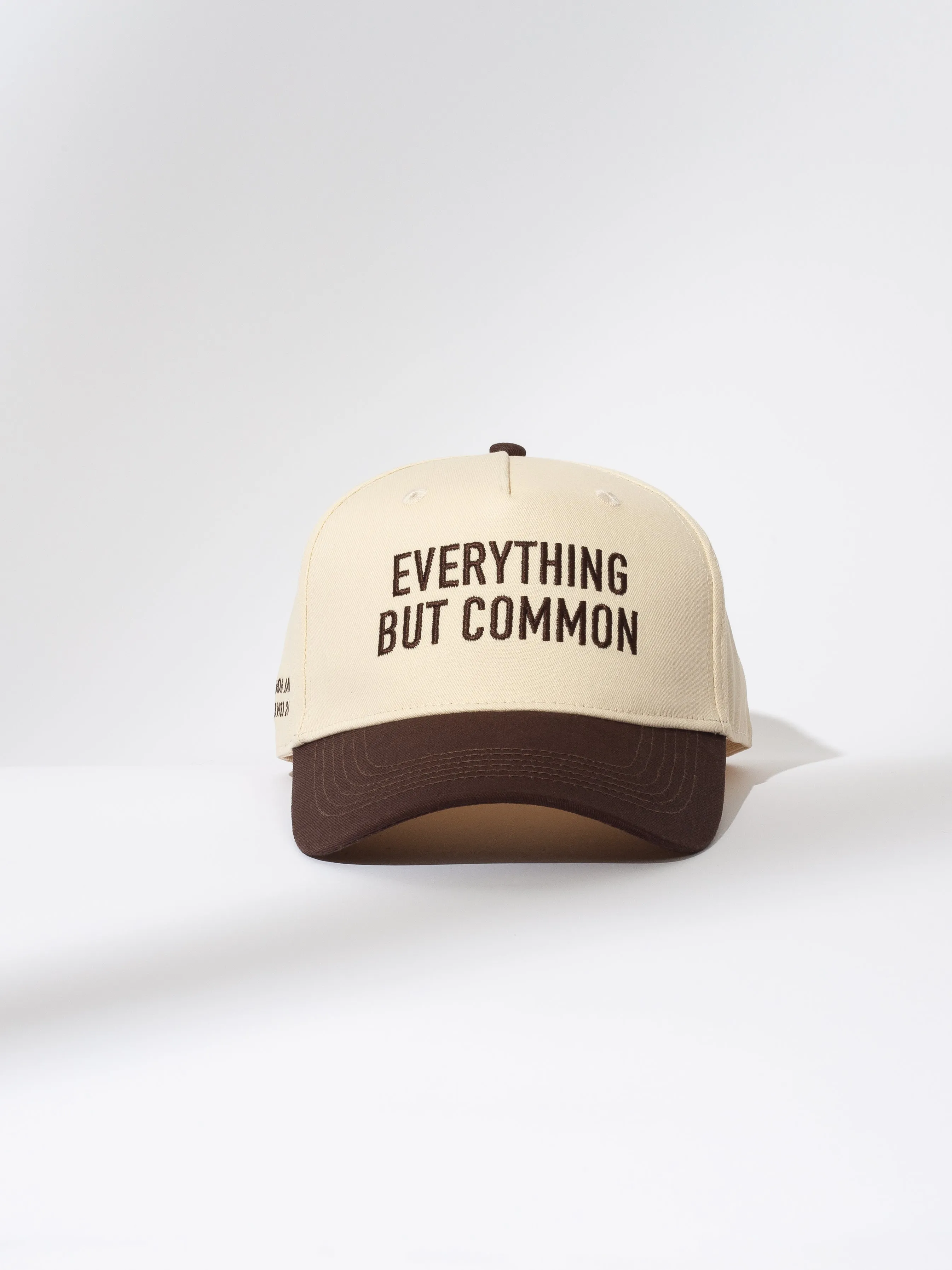 Everything But Common Trucker Hat