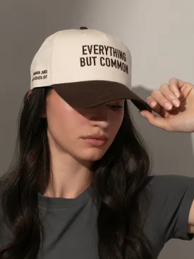 Everything But Common Trucker Hat