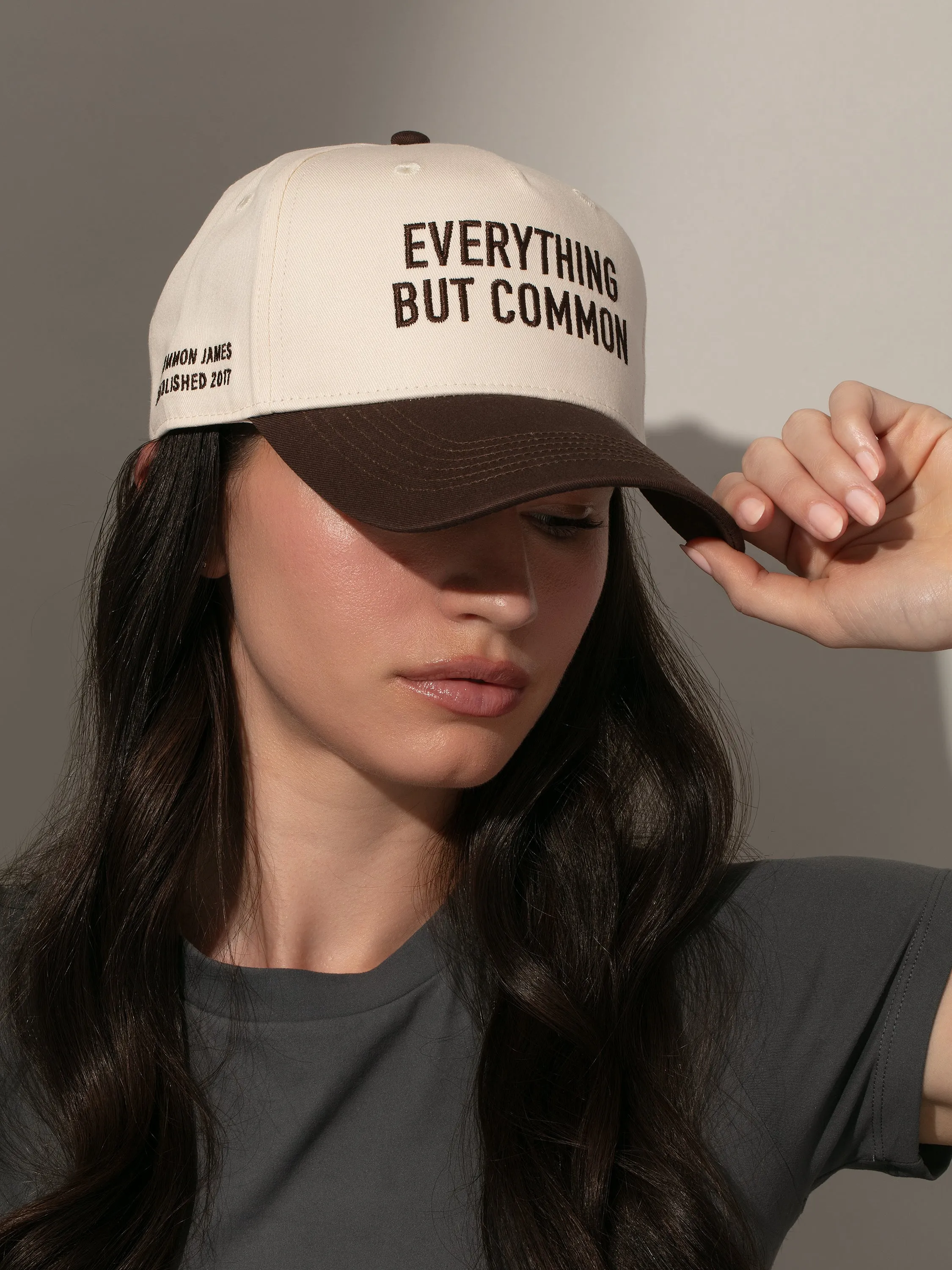 Everything But Common Trucker Hat