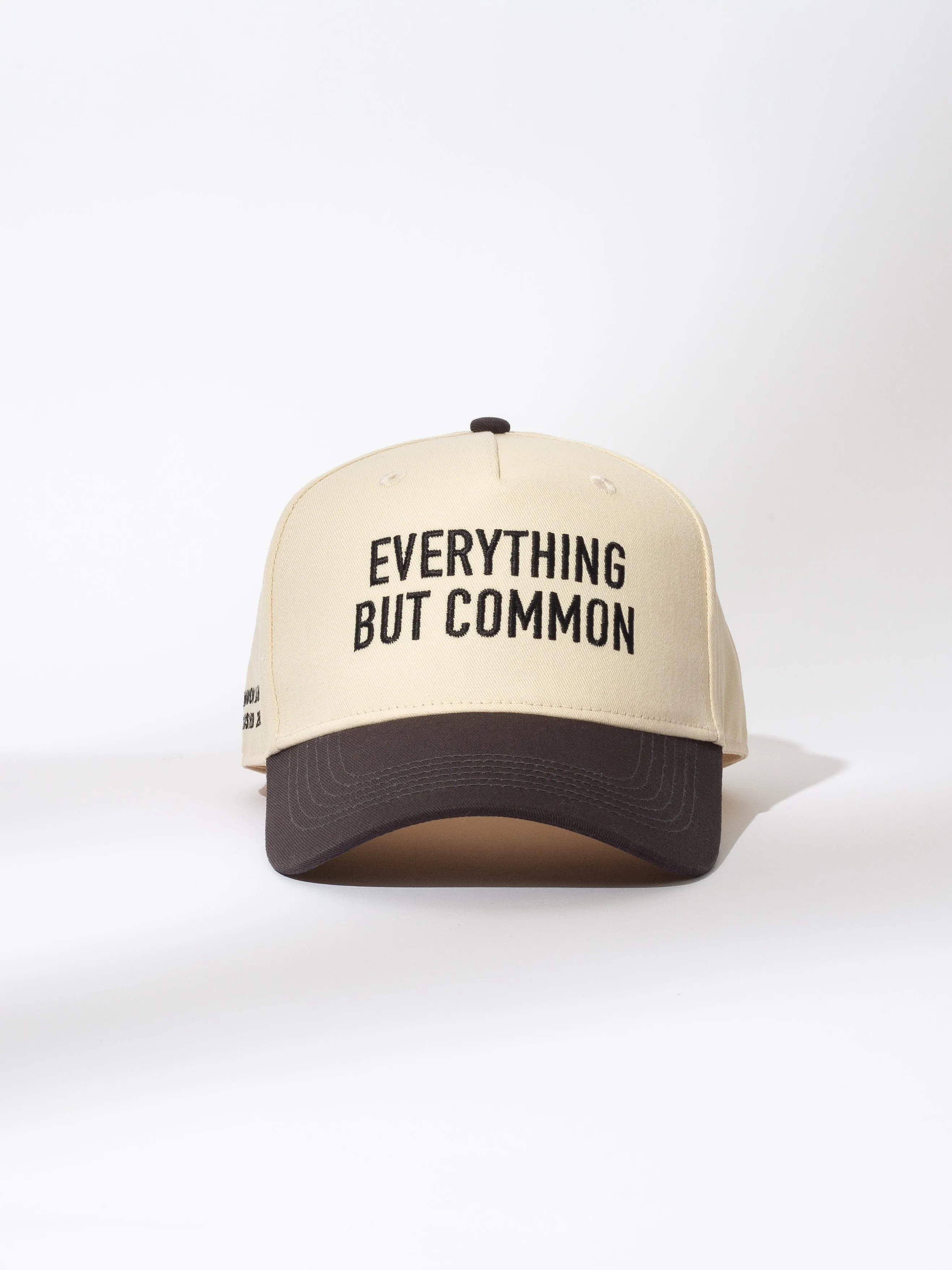 Everything But Common Trucker Hat