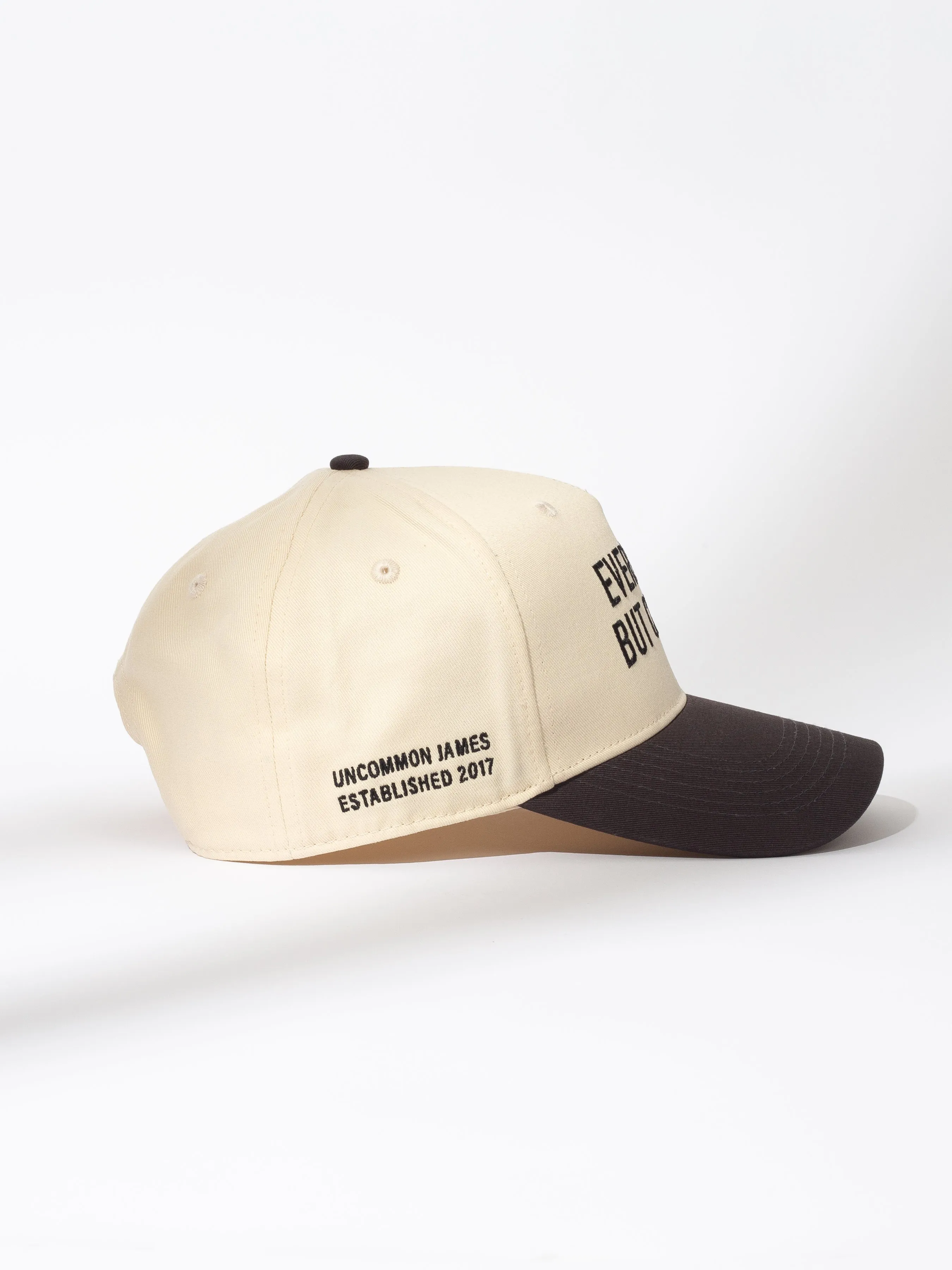 Everything But Common Trucker Hat