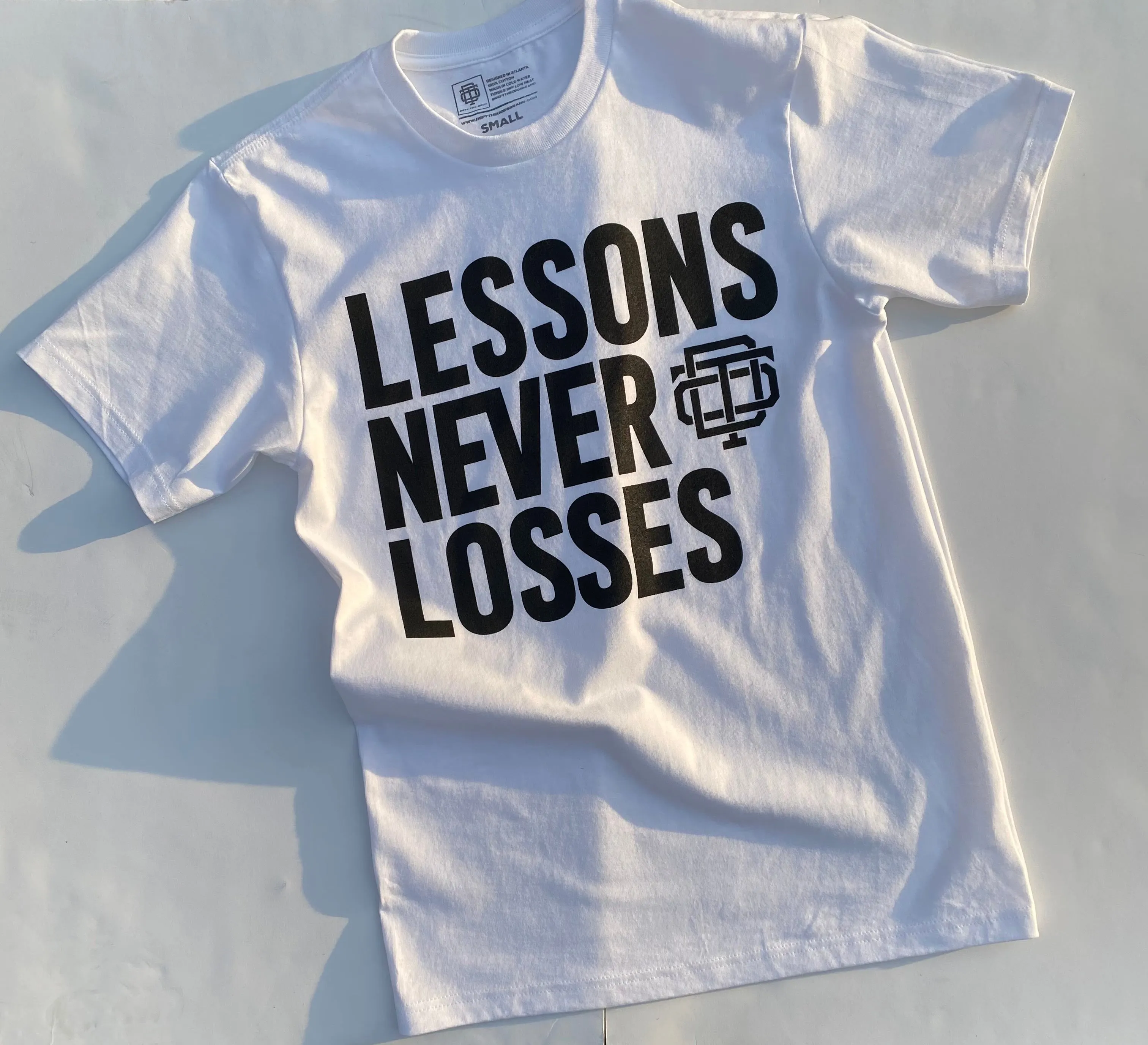 Lessons Never Losses Tee